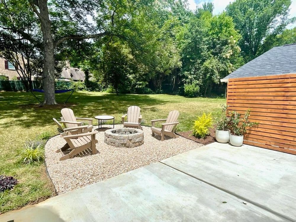 Project Back Patio Makeover with Fire Pit and Privacy Wall in Winston-Salem image
